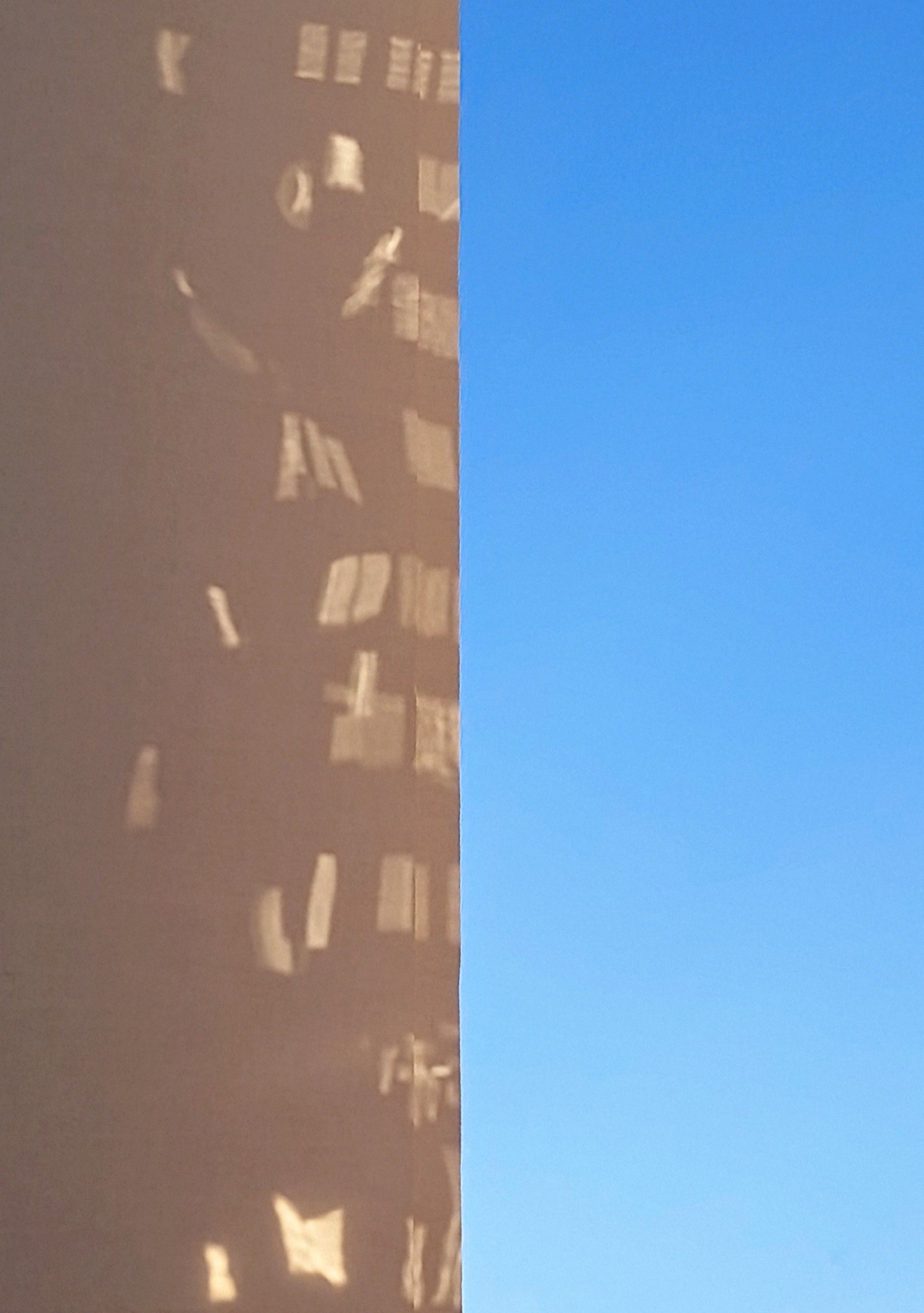 Solar screens reducing glare in an office