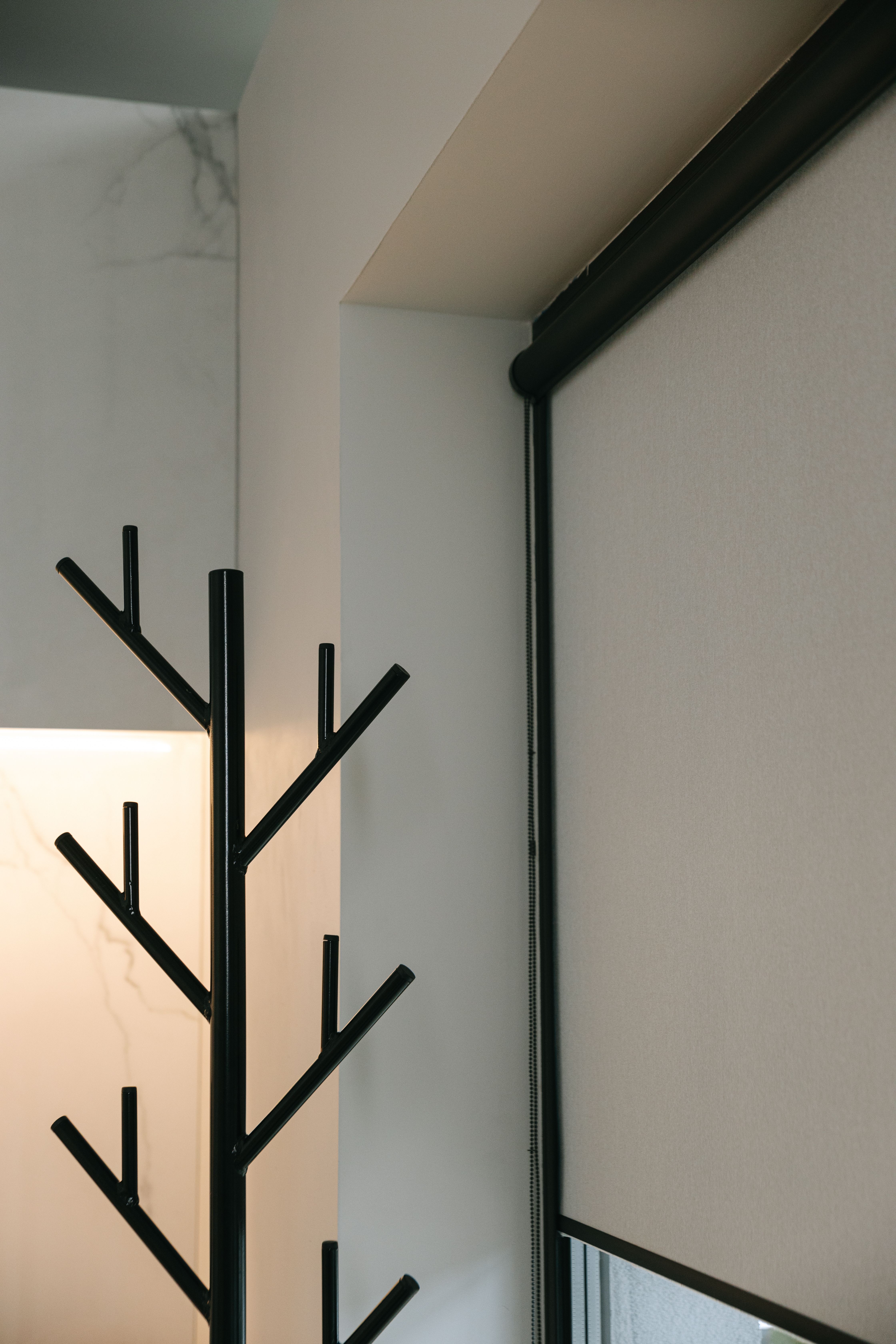 Elegant roller shades in a bedroom